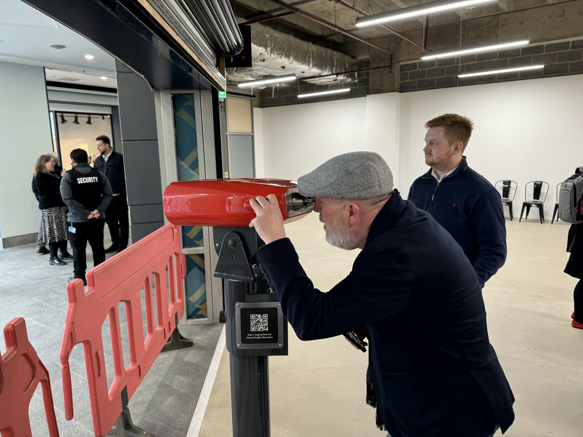 The immaculately-dressed Mark Hubert of James St Peter's giving the AR binoculars a test